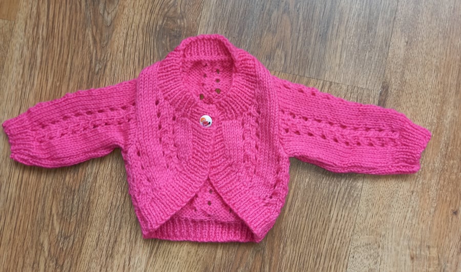 Hand knitted baby girls cardigan