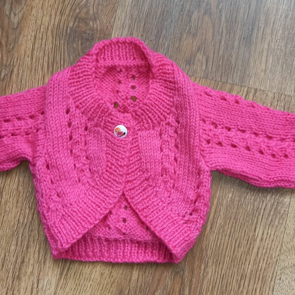 Hand knitted baby girls cardigan