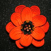 ORANGE FELT FLOWER CORSAGE