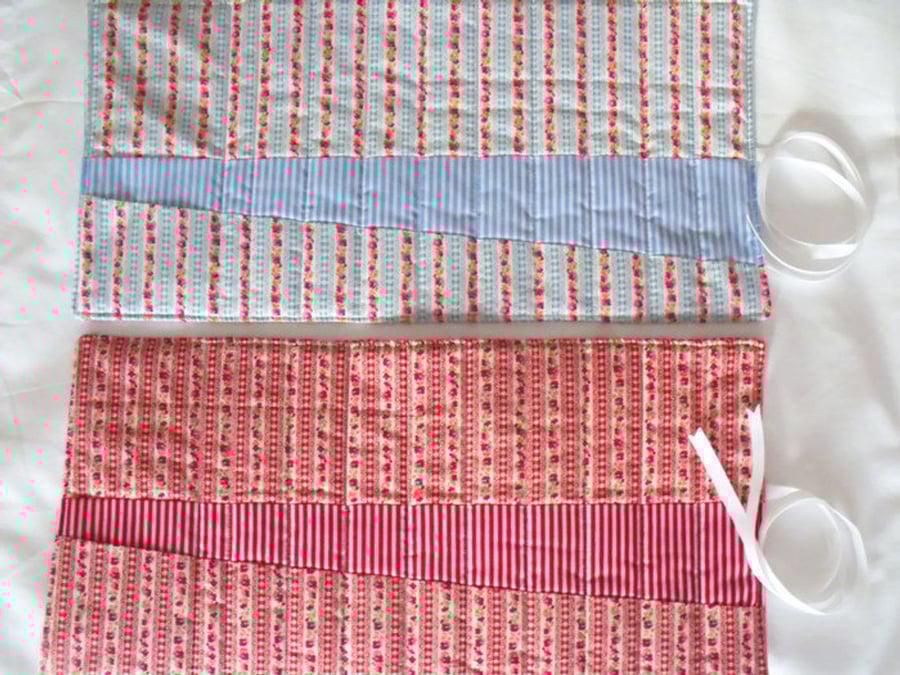 quilted crochet hook storage tool roll, red floral fabric