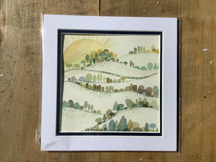 Original watercolour painting of the countryside waking up to a sunny day.
