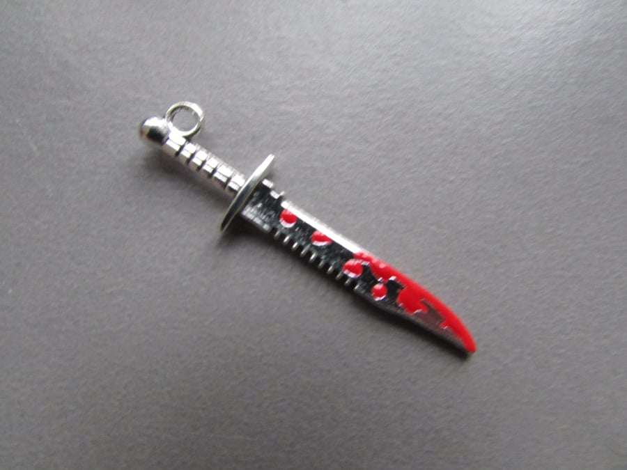 Blood stained Dagger Sword Tibetan Jewellery Charm