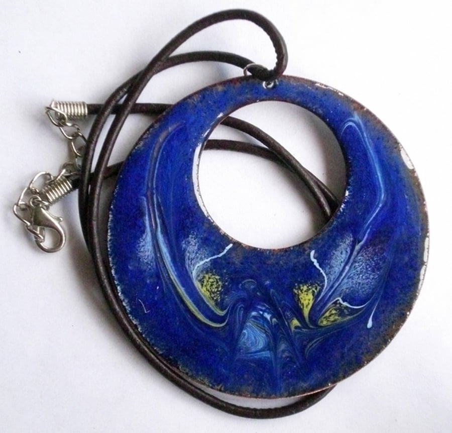 large pendant - pierced circle scrolled gold and white on blue over clear enamel