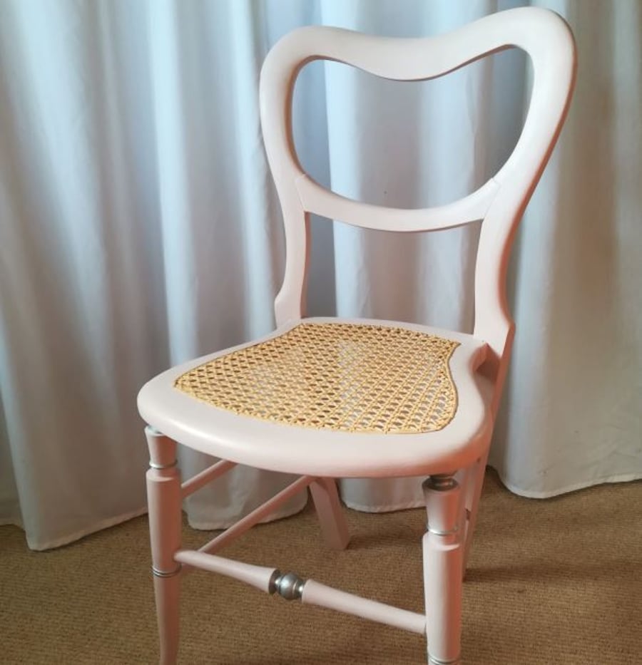 Antique chair in pale pink chalk paint.