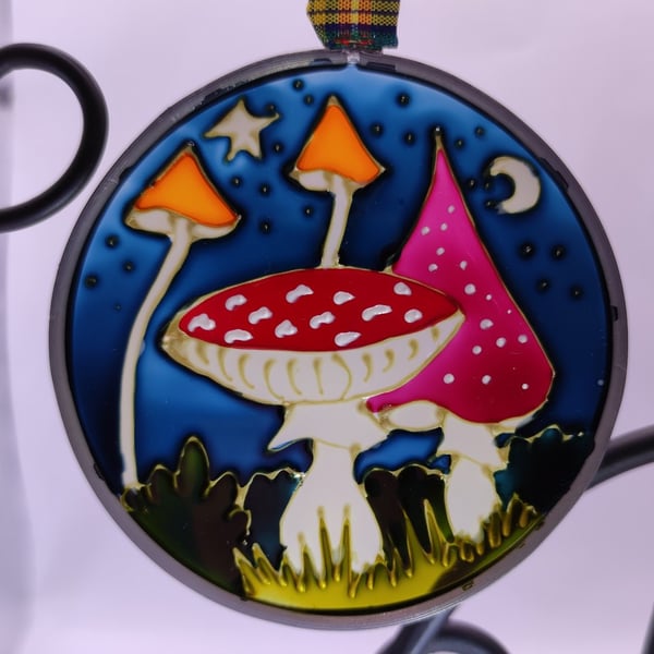 Handmade glass painted window hanging or Christmas tree bauble