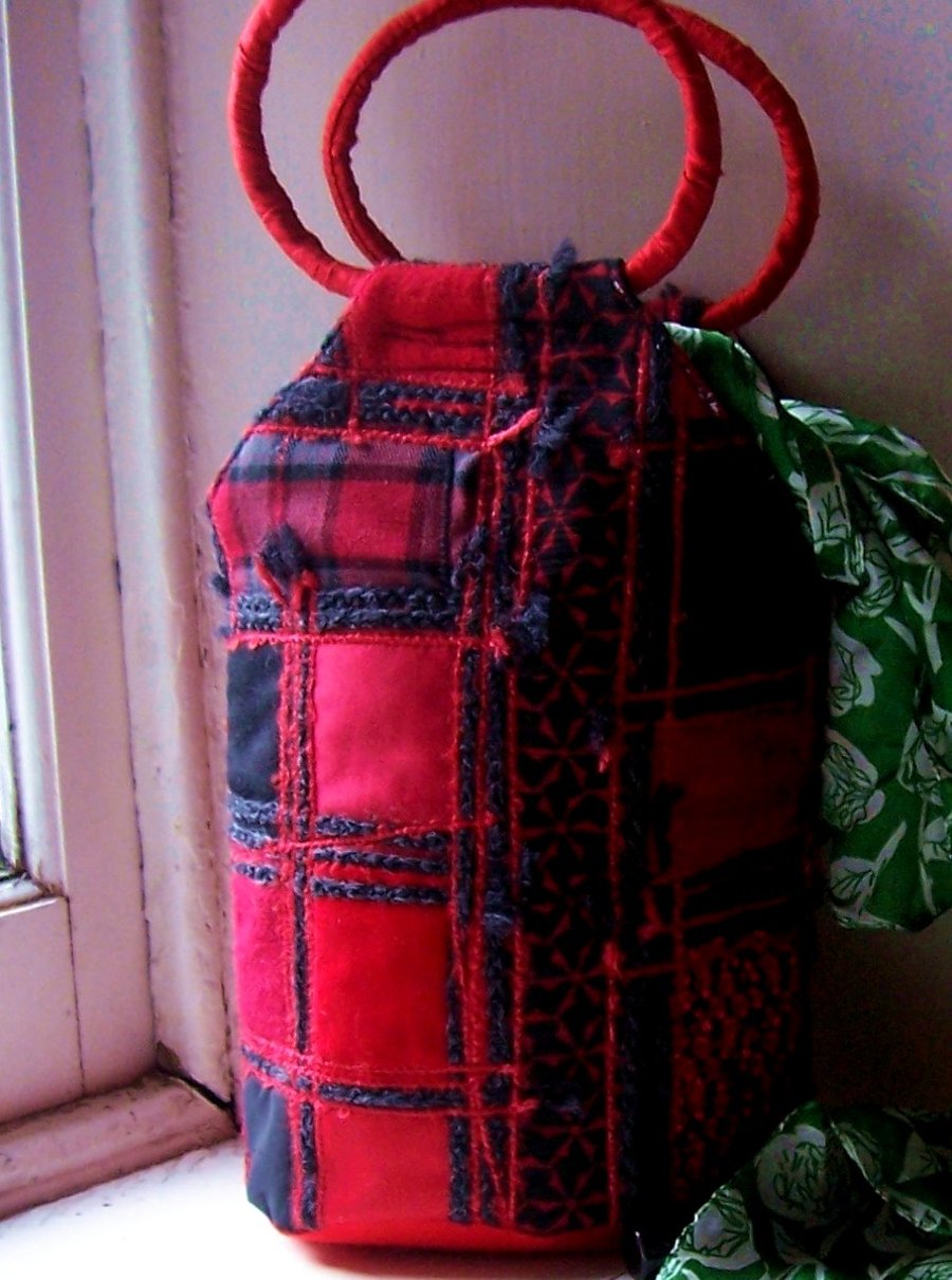 Patchwork fabric bucket bag in red and black mixed textiles