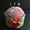 ceramic pincushion with flower button