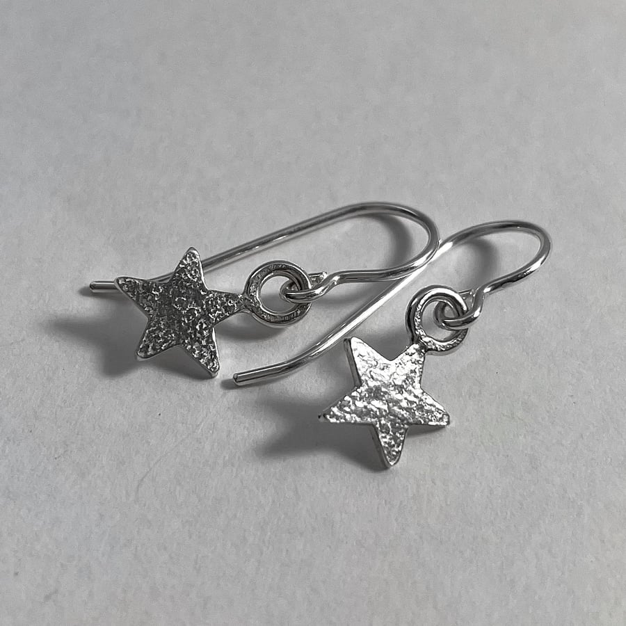 Sterling silver star dangle earrings