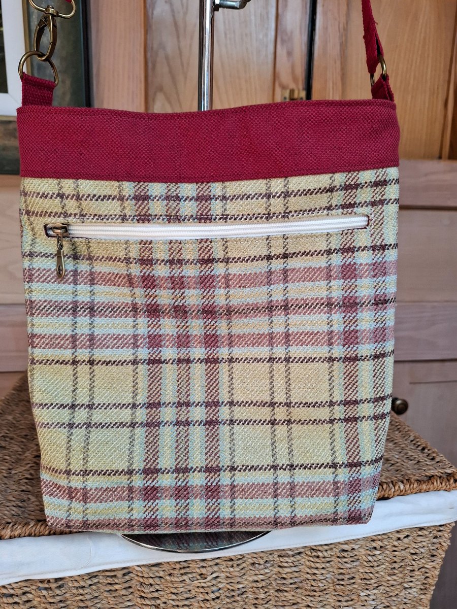 Red canvas and tartan bag