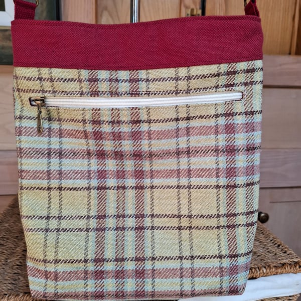 Red canvas and tartan bag