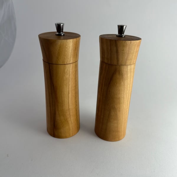 Salt and pepper grinders in cherry
