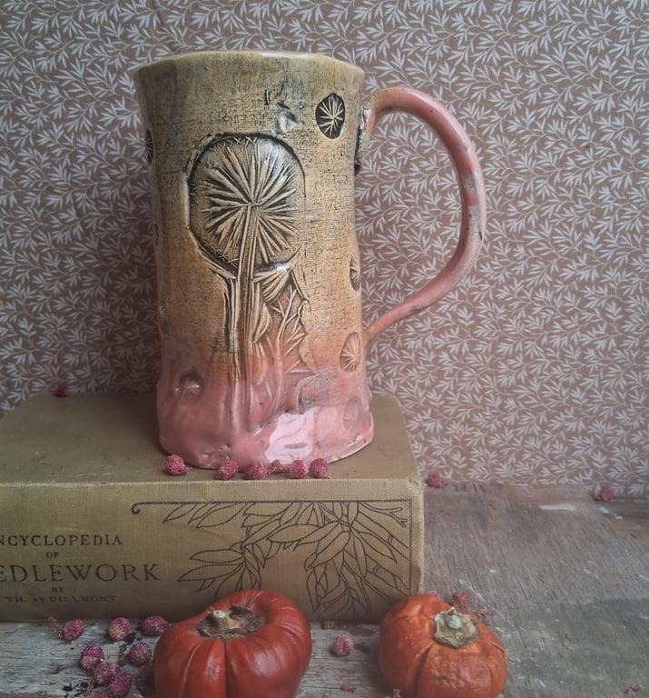 Dandelion design coffee mug, tea cup in pink and apricot ceramic pottery