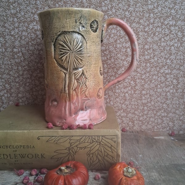 Dandelion design coffee mug, tea cup in pink and apricot ceramic pottery