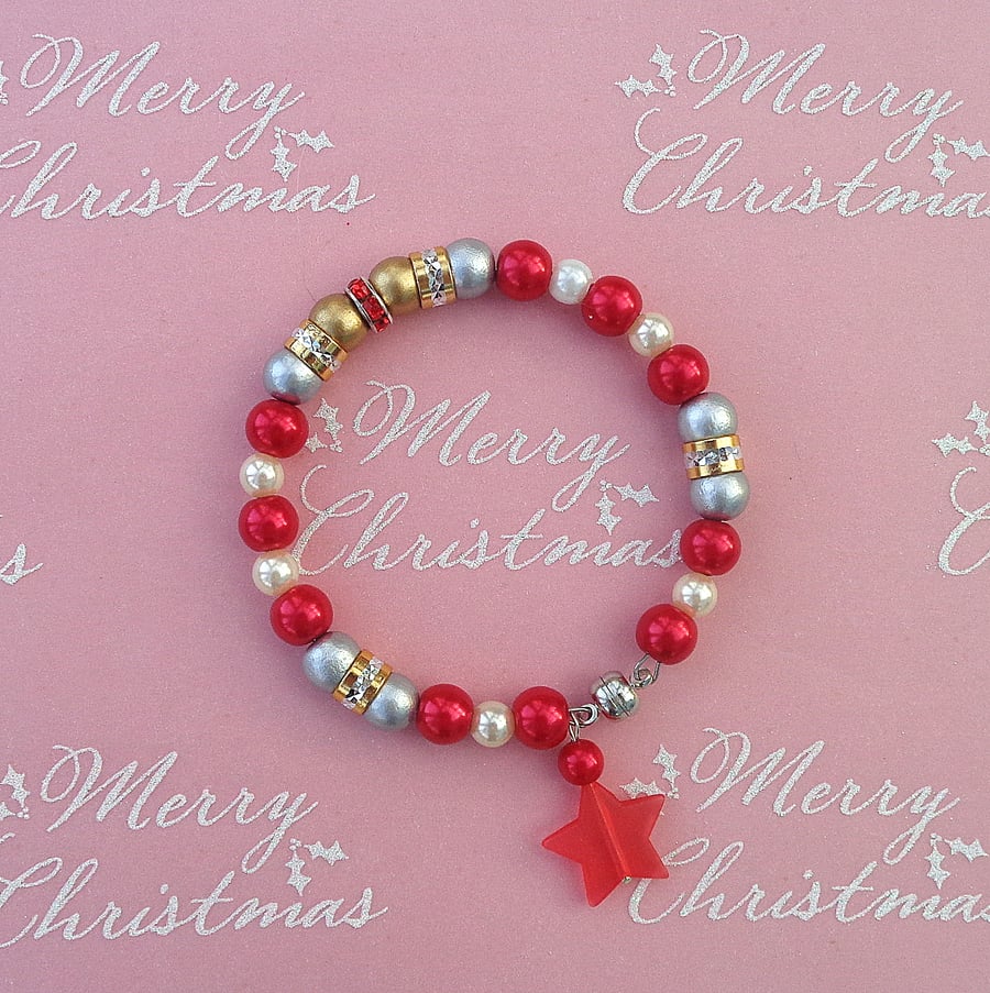 Christmas bracelet. Red, silver, gold beads, magnetic clasp & star charm
