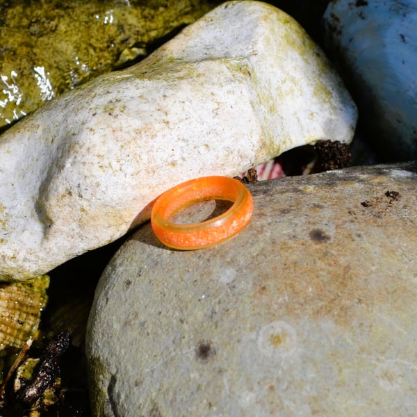 Orange banded Resin finger ring.