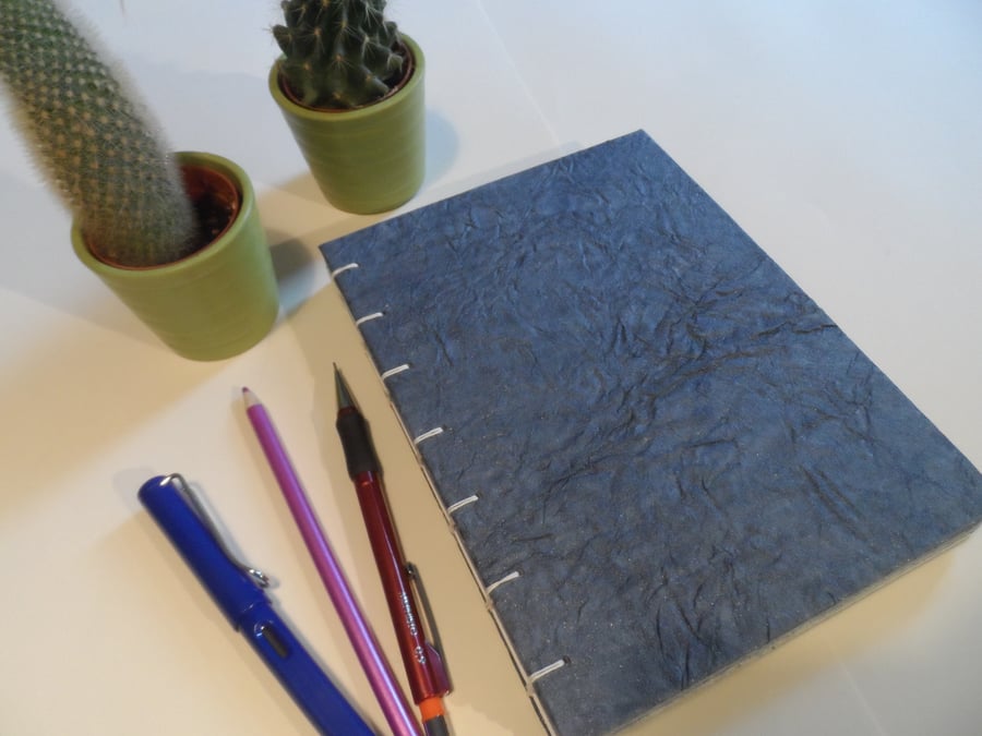 Hand made book with Coptic stitch binding and mixed papers (no 21)