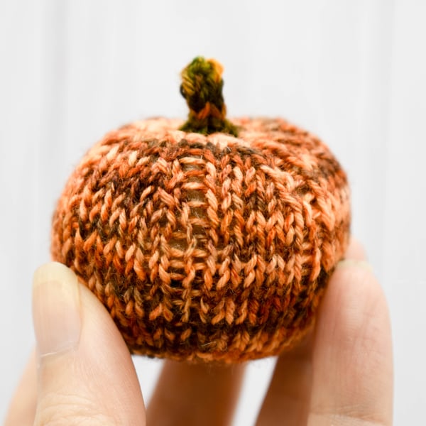 Hand knitted mini pumpkin pin cushion variegated orange