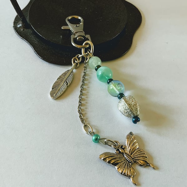 Metal Butterfly And Leaf Bag Charm. 