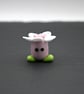 pink glass flower head figure - Image 2