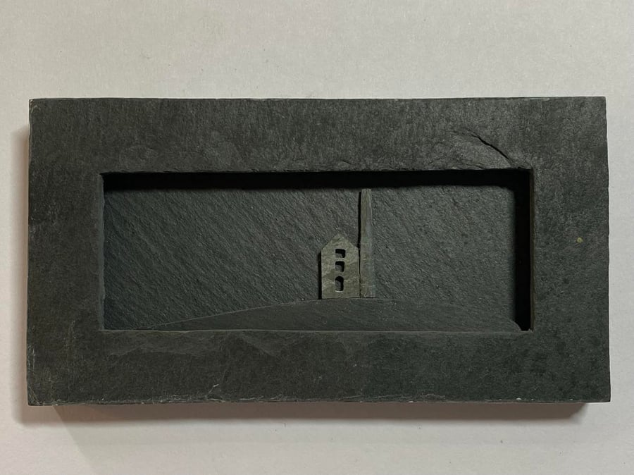 Tiny Cornish Engine House framed in slate.