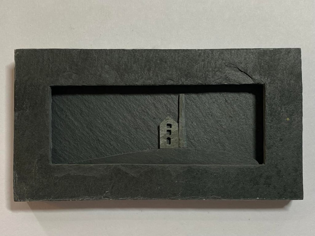 Tiny Cornish Engine House framed in slate.