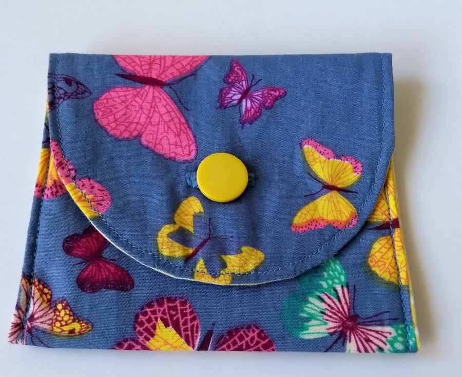 Butterfly print small coin or card purse.