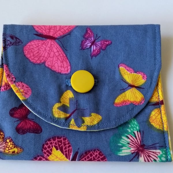 Butterfly print small coin or card purse.