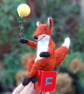 Fox holding a balloon whilst sat on a wood alphabet block   - needlefelt.   