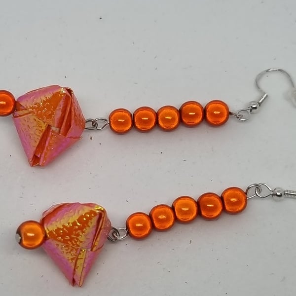 Origami earrings:  orange iridescent paper and miracle beads 