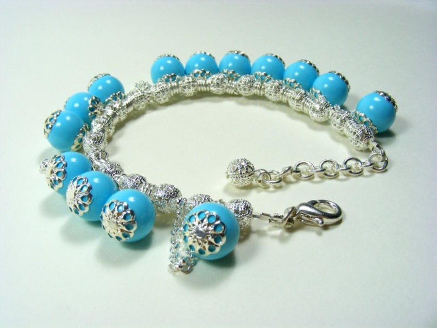 Turquoise and Silver Charm Bracelet