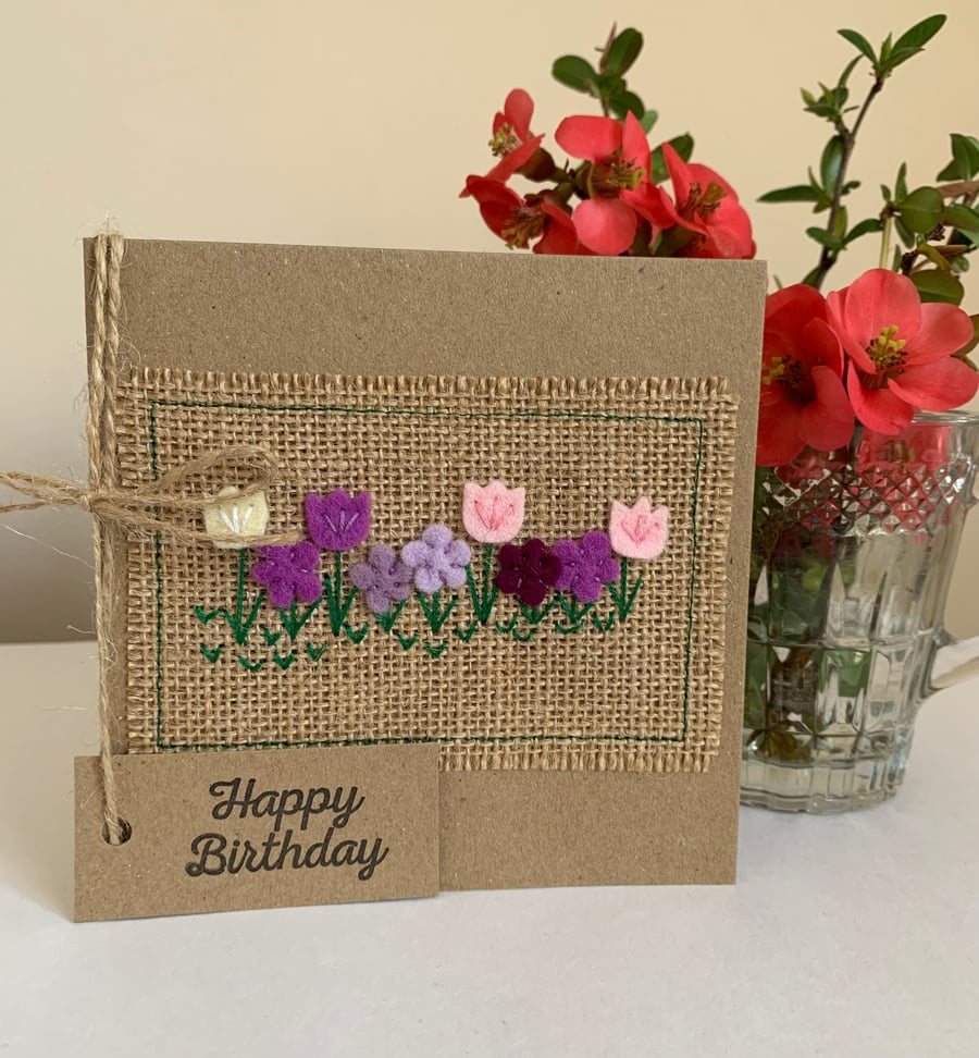Birthday card. Row of purple and pink spring flowers. Wool felt. Handmade Card.