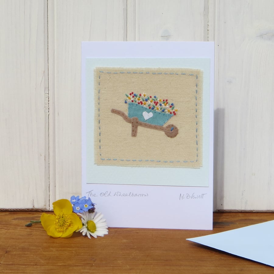 The Old Wheelbarrow, hand-stitched miniature applique with embroidered flowers