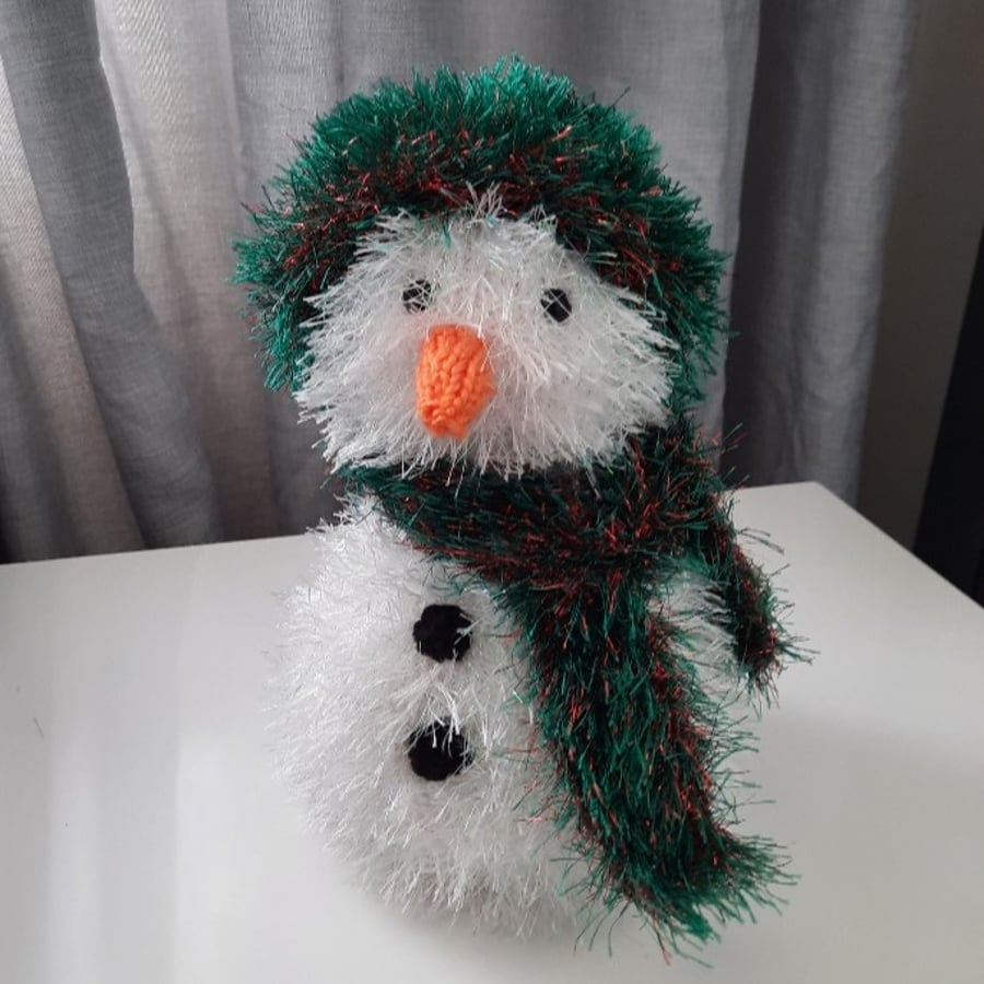 Snowman with green and red hat and scarf hand knitted and perfect for Christmas!