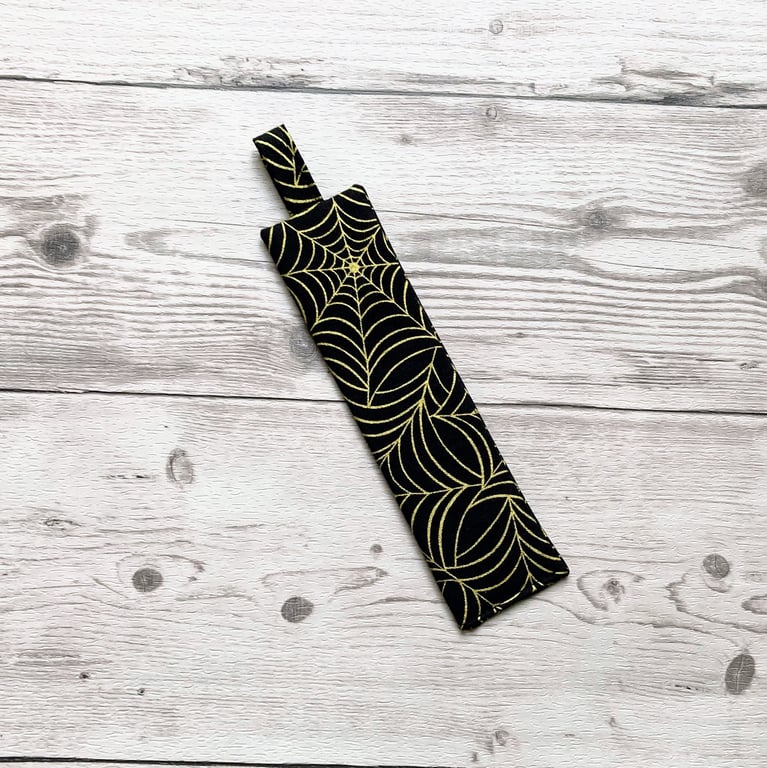 Cotton fabric bookmark. Spiderwebs, cobwebs, spooky theme.