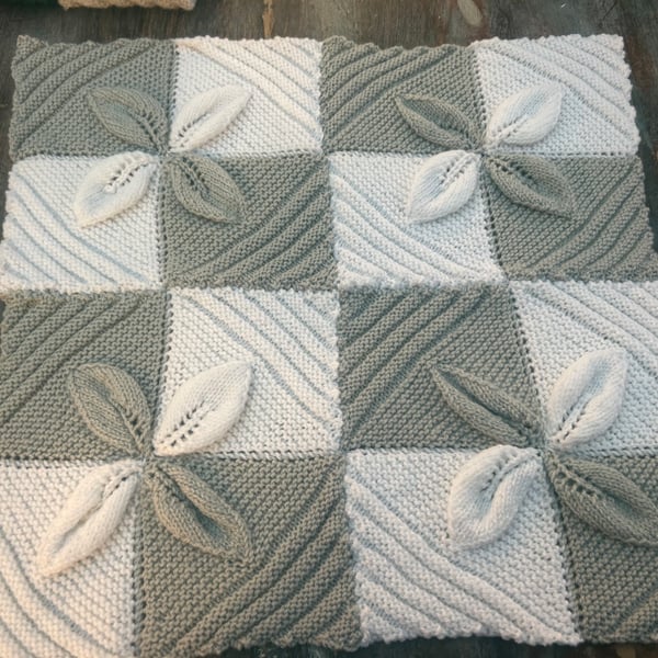 Hand knitted leaf blankets for babies , baby shower gift .