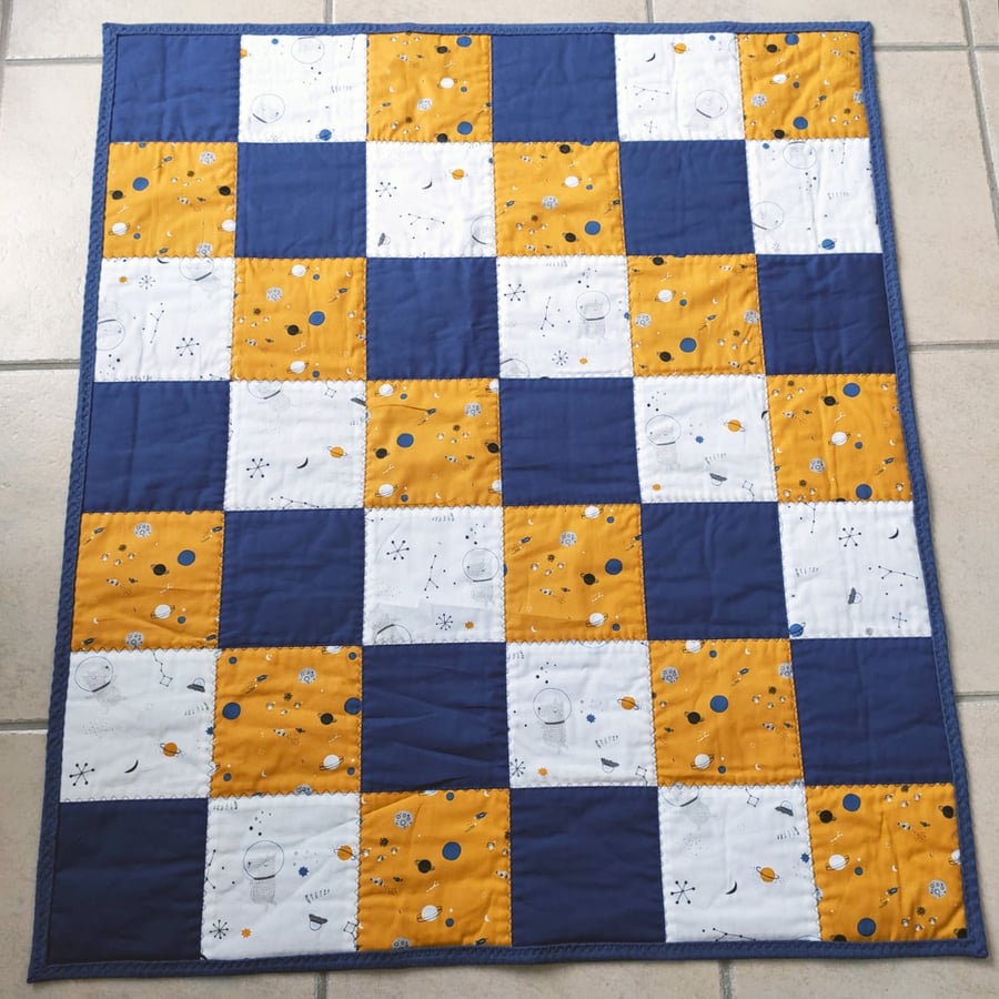 Space baby quilt blanket handmade in blue, yellow and white, backed with waffle