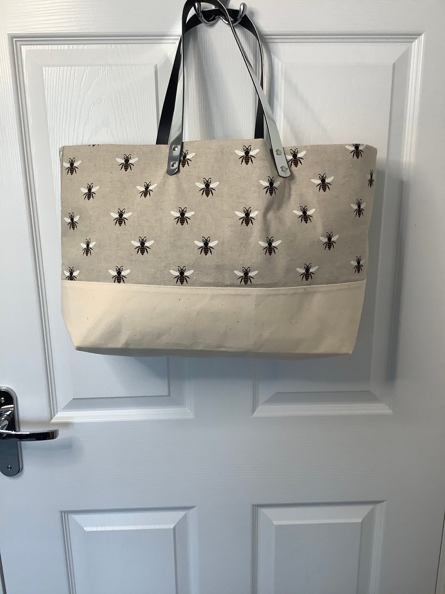 Attractive Bees design wide and fully lined tote bagwith Silver PU handles