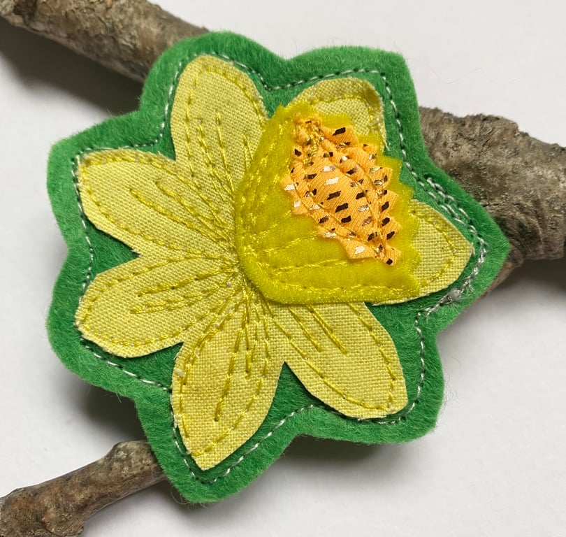 Upcycled yellow flower daffodil brooch pin or badge.