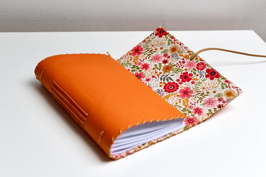 A6 Fold Over Orange Leather handmade notebook floral fabric lining plain paper 