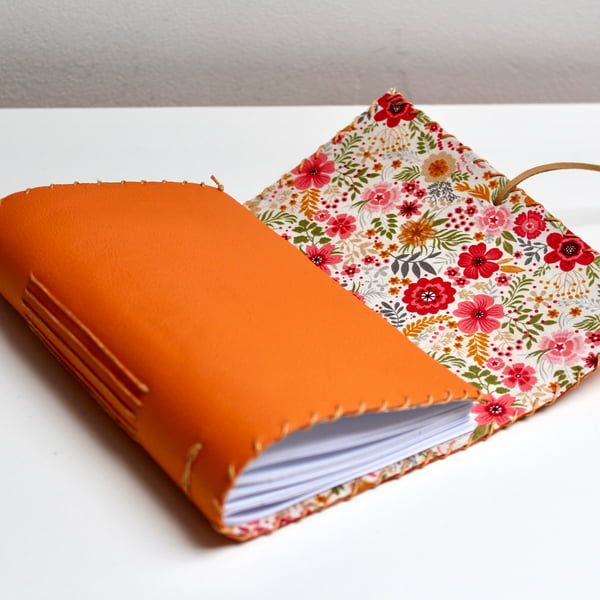 A6 Fold Over Orange Leather handmade notebook floral fabric lining plain paper 