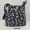 Japanese knot bag,  medium shoulder bag, reversible denim and daisy. 