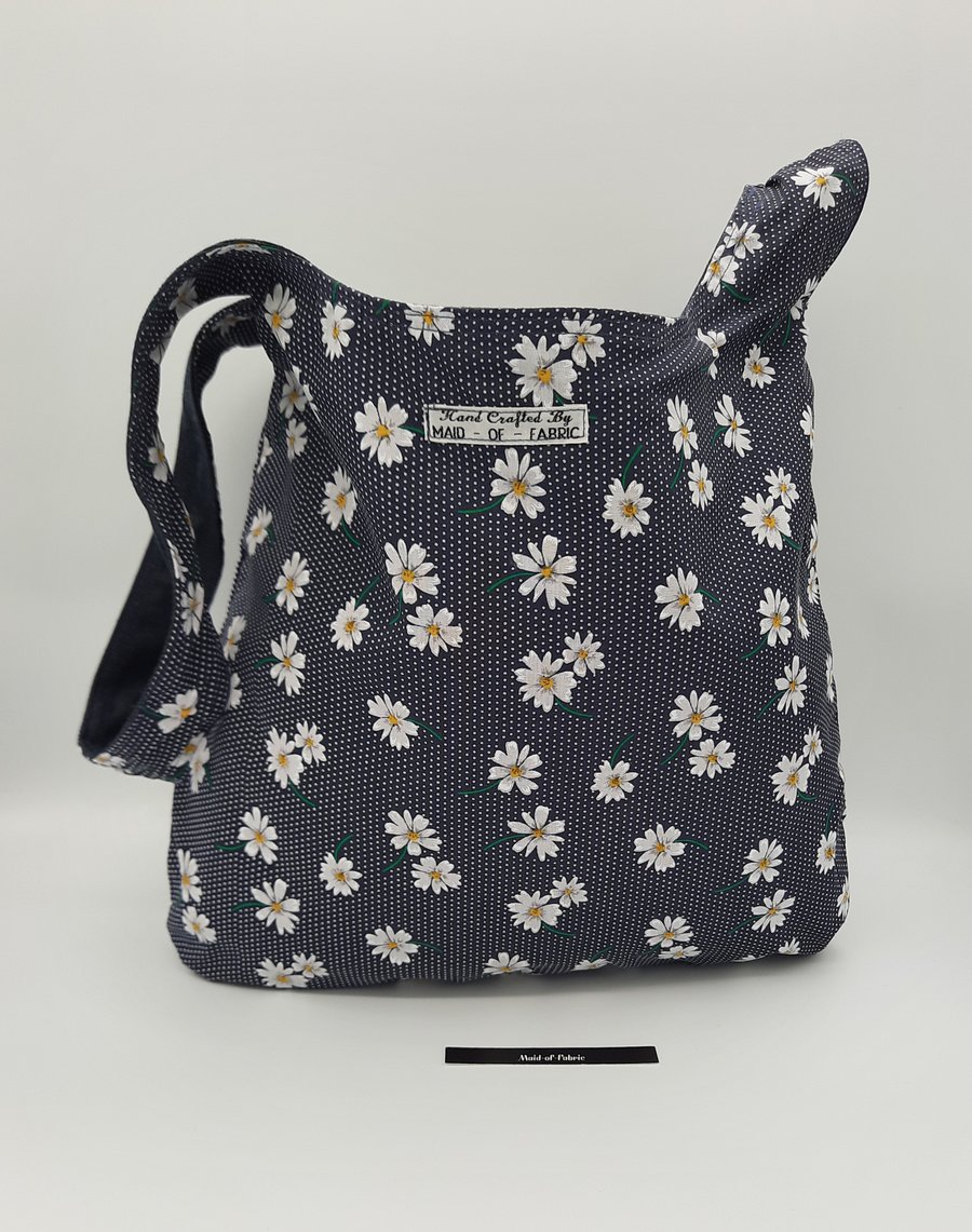 Japanese knot bag,  medium shoulder bag, reversible denim and daisy. 