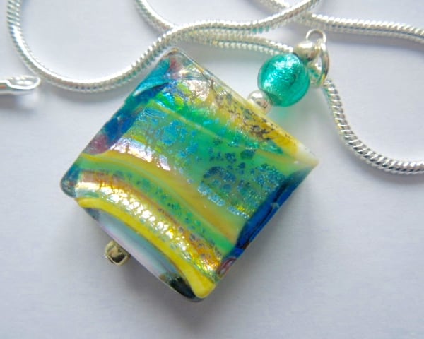 Murano glass green square spangle pendant with sterling silver.