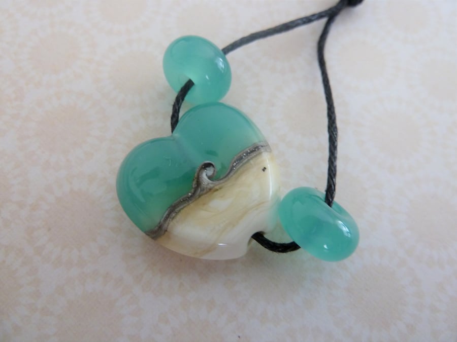 handmade lampwork green heart bead