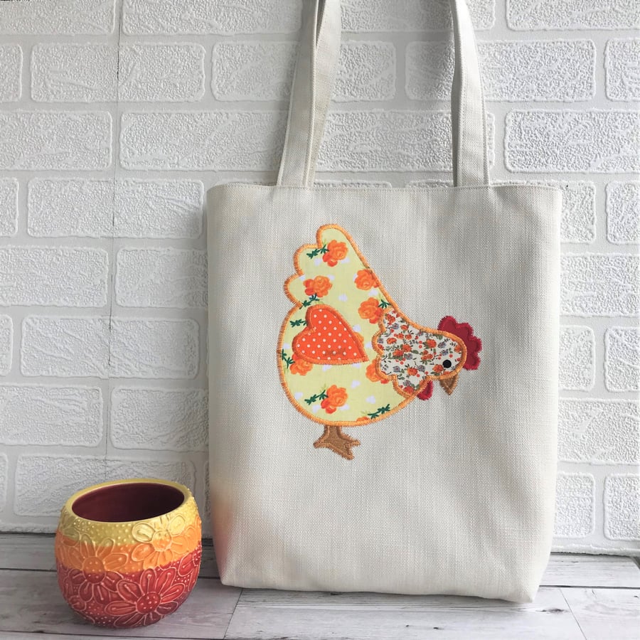 Chicken tote bag in cream with yellow and orange floral and polka dot chicken