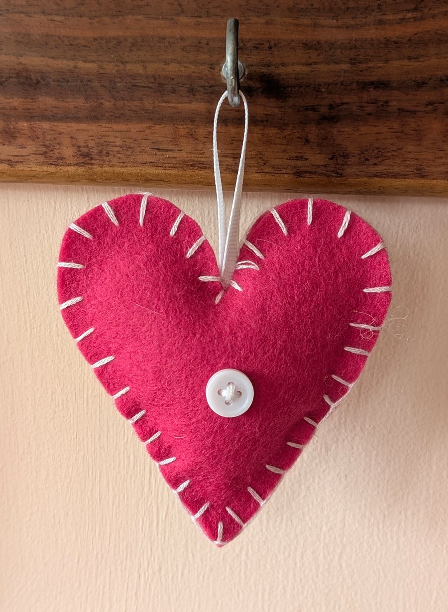 Handmade handstitched felt heart - pink with white stitching