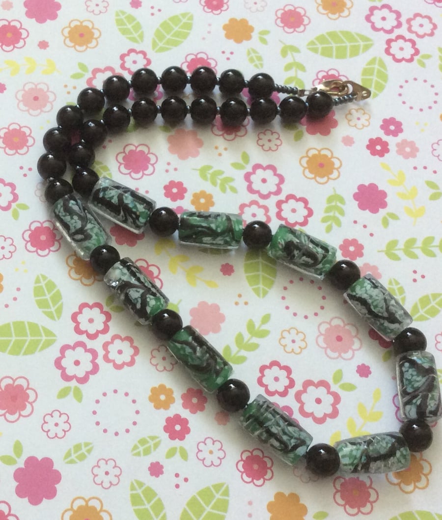 Striking all round Black and Green Glass Bead Necklace