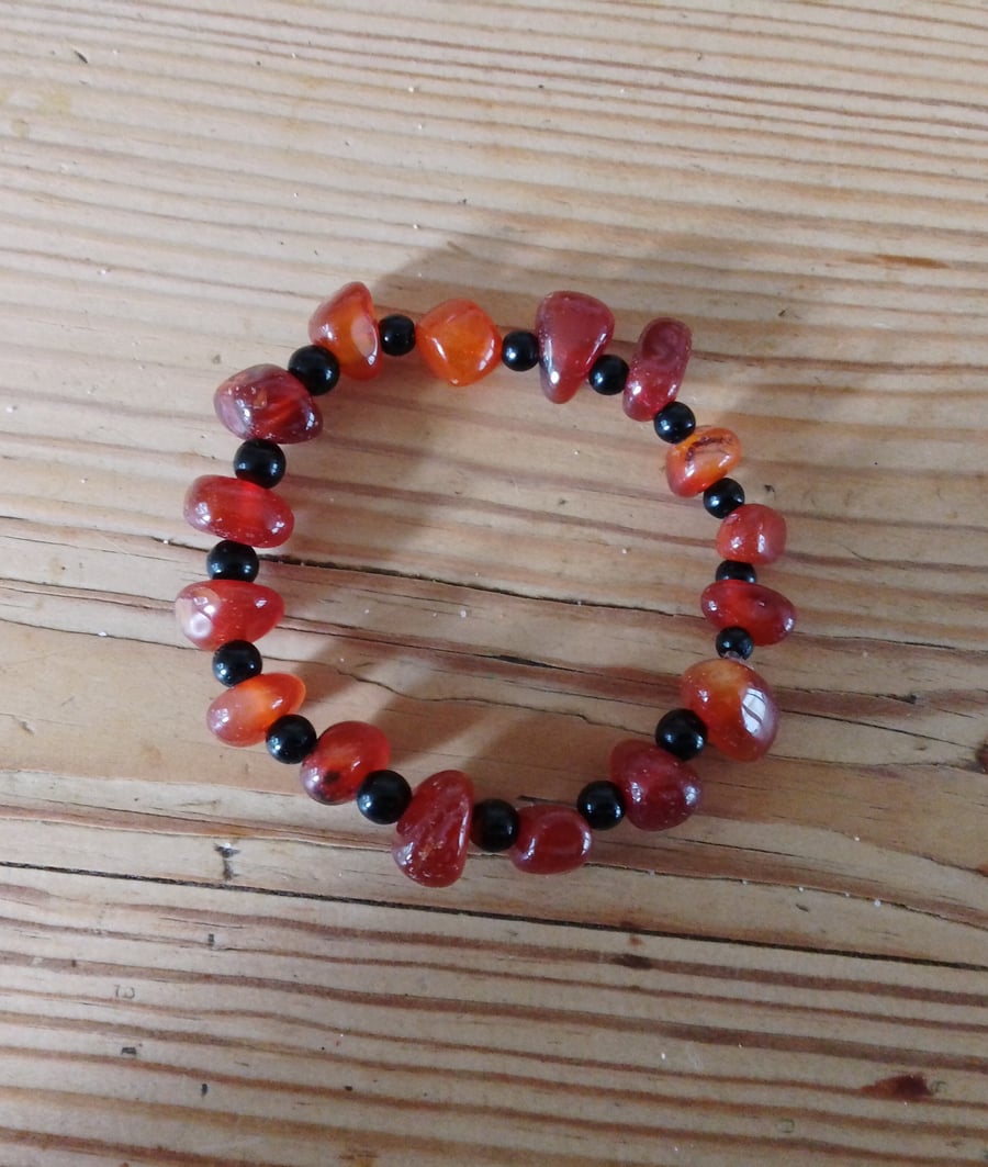 Handmade bracelet made using pre-loved beads.