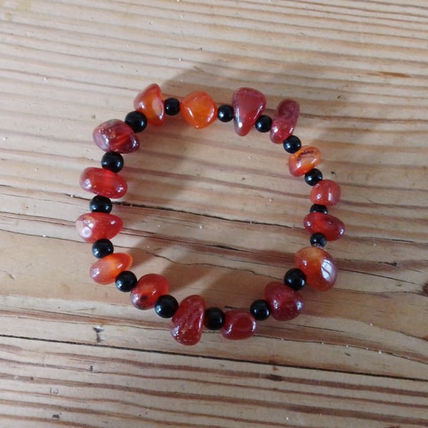 Handmade bracelet made using pre-loved beads.