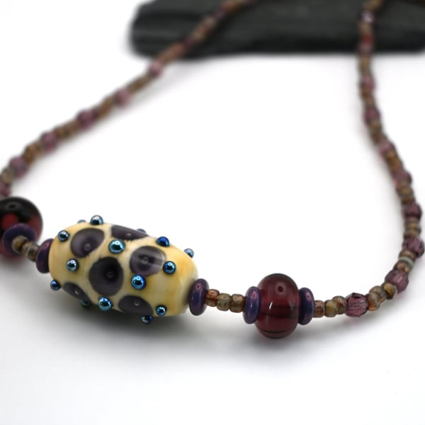 lampwork glass purple dots necklace